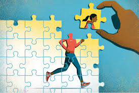 An image of a person running over puzzle pieces.
